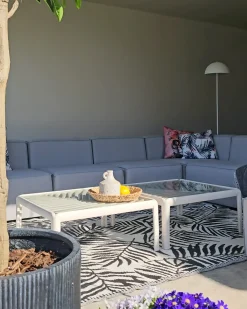 Divano angolare da giardino con pouf 7 posti AREZZO Lato Sinistro Modulare Grigio chiaro