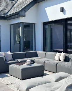 Divano angolare da giardino con pouf 7 posti AREZZO Lato Sinistro Modulare Grigio