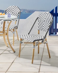 Set di 4 sedie RIFREDDO Rattan sintetico (PE) Nero/Bianco