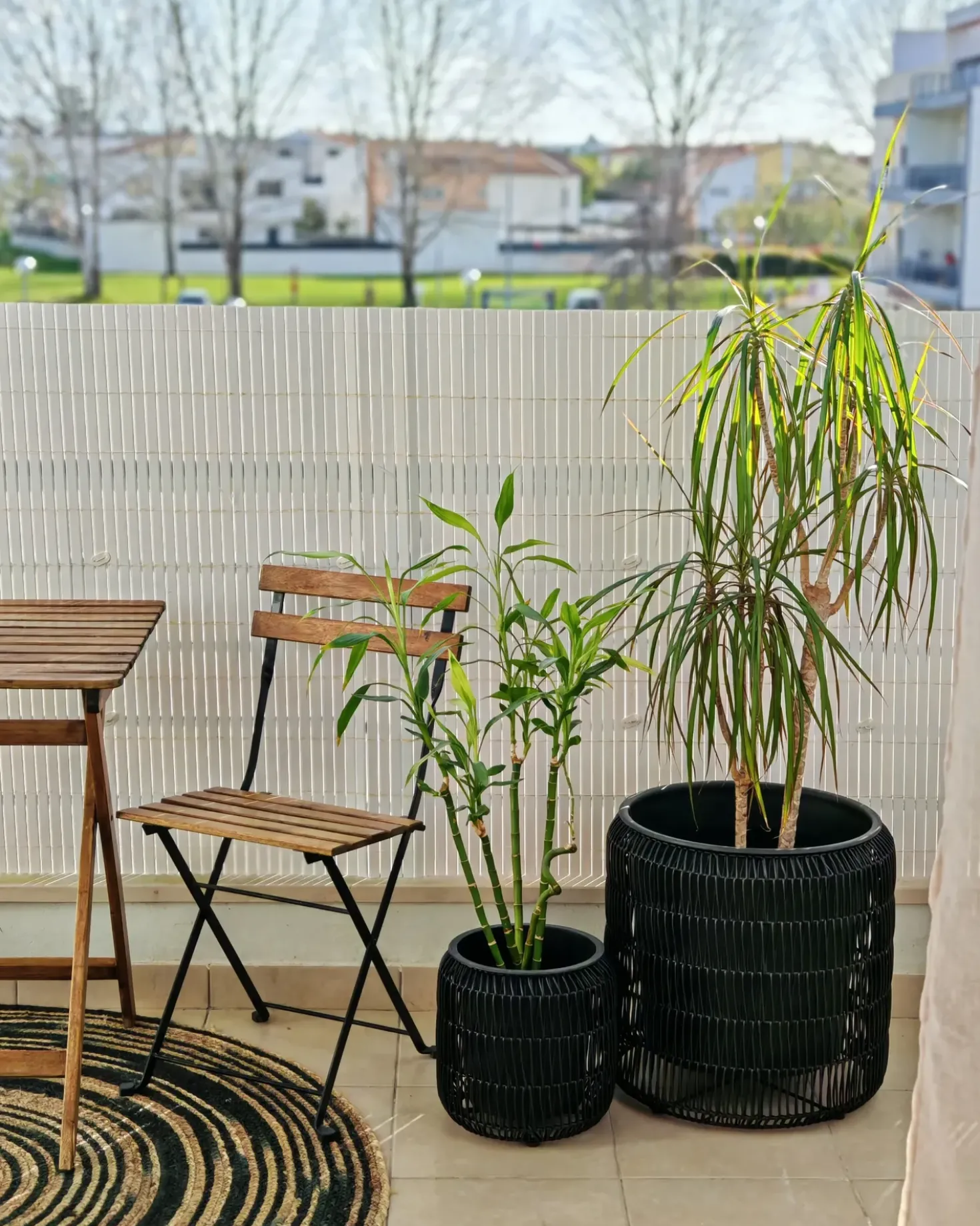Set di 2 vasi per piante BRODIEA Rattan sintetico (PE) 26/45 cm Nero